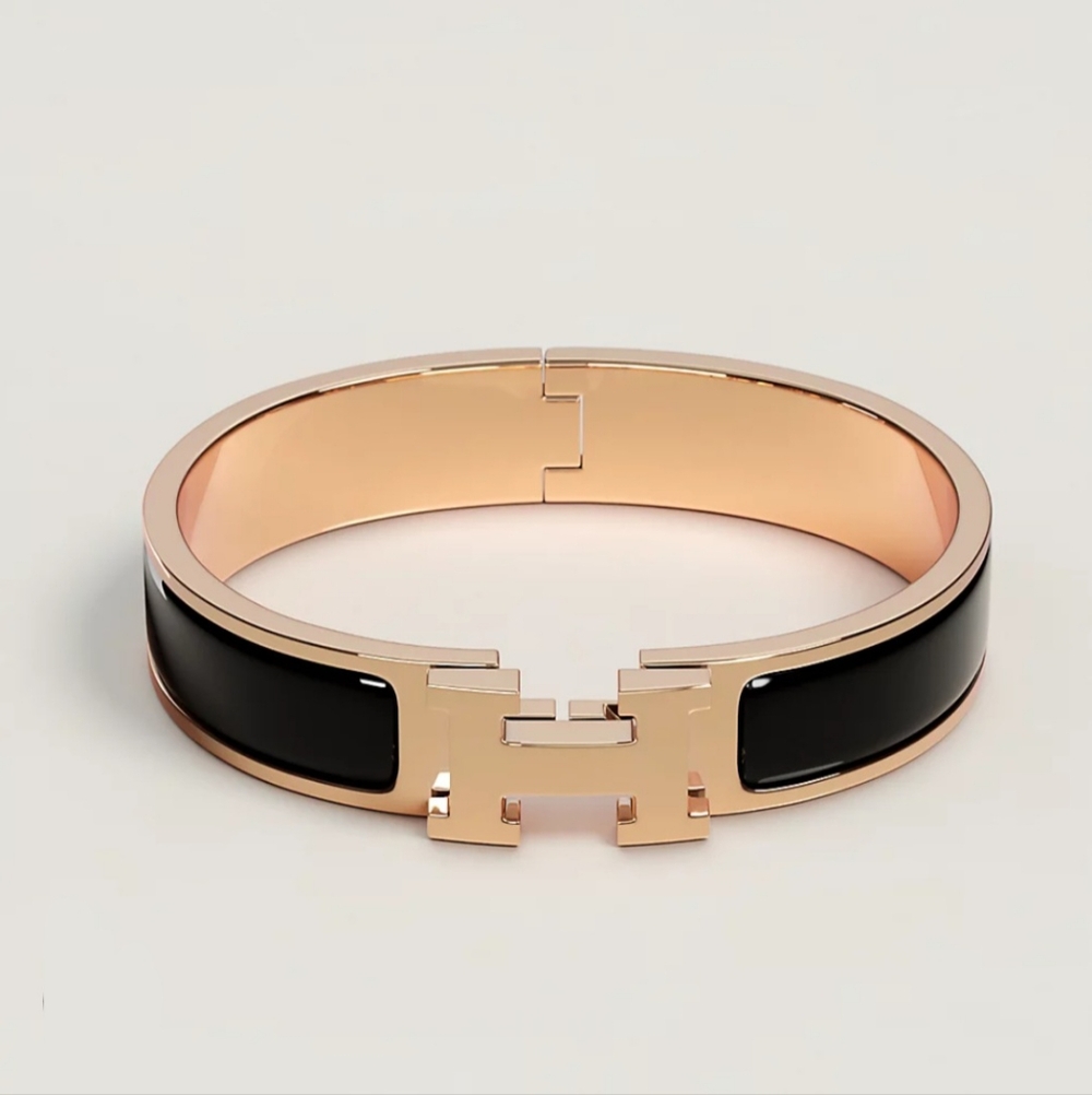 Black and Gold Hermes Clic H Bracelet